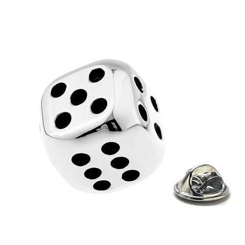Silver dice-shaped lapel pin with black dots on a white background