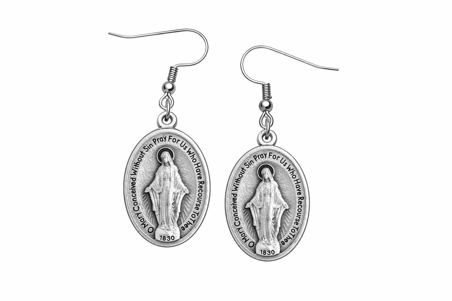 Pair of silver religious earrings on a white background