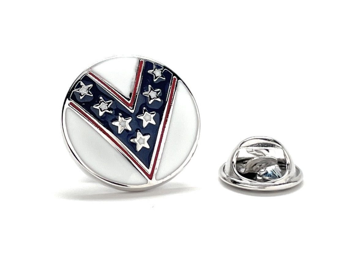 A round enamel pin with a silver rhodium plated backing, featuring a design with stars and stripes, and the text 'KING OF THE DAREDEVILS'.