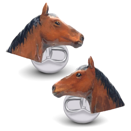 Two horse head bottle openers on a white background