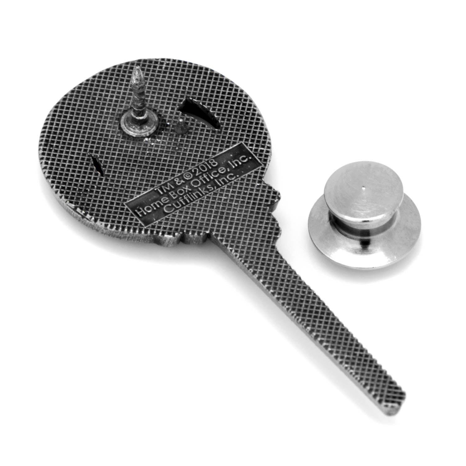 Metallic tool with textured surface and cylindrical component on a white background
