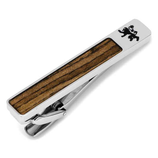 Tie clip with wooden finish and black emblem on a white background