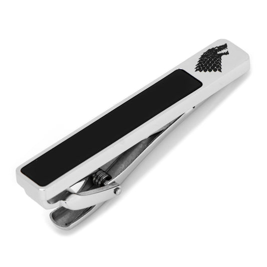 Silver tie clip with black center and logo on a white background