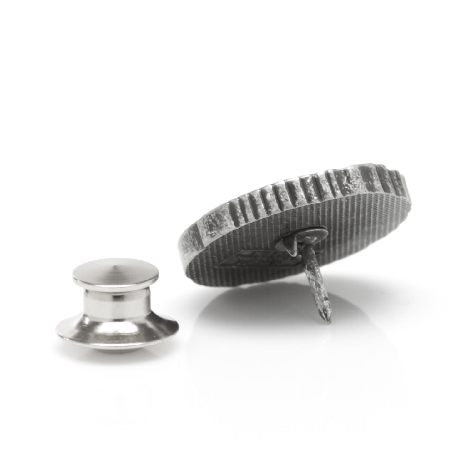 Silver textured cufflinks on a white background