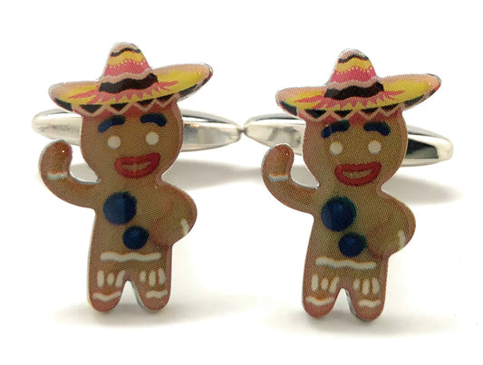 Gingerbread man cufflinks with sombrero hats on a white background