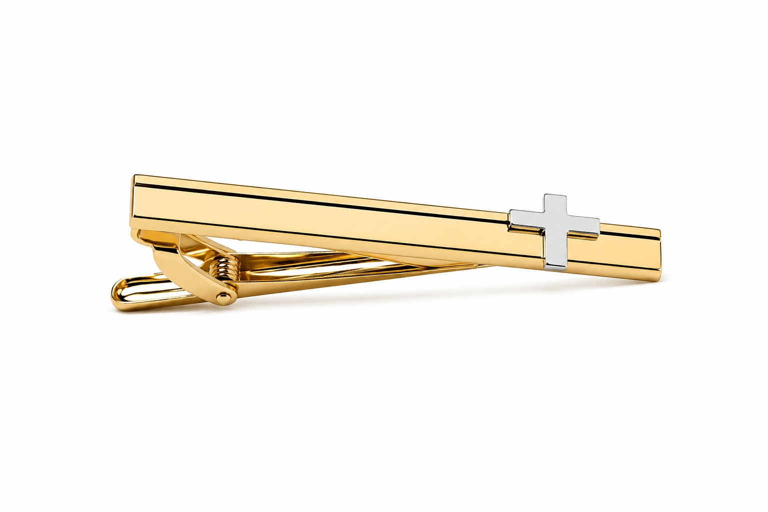 Gold tie clip with silver cross on a white background