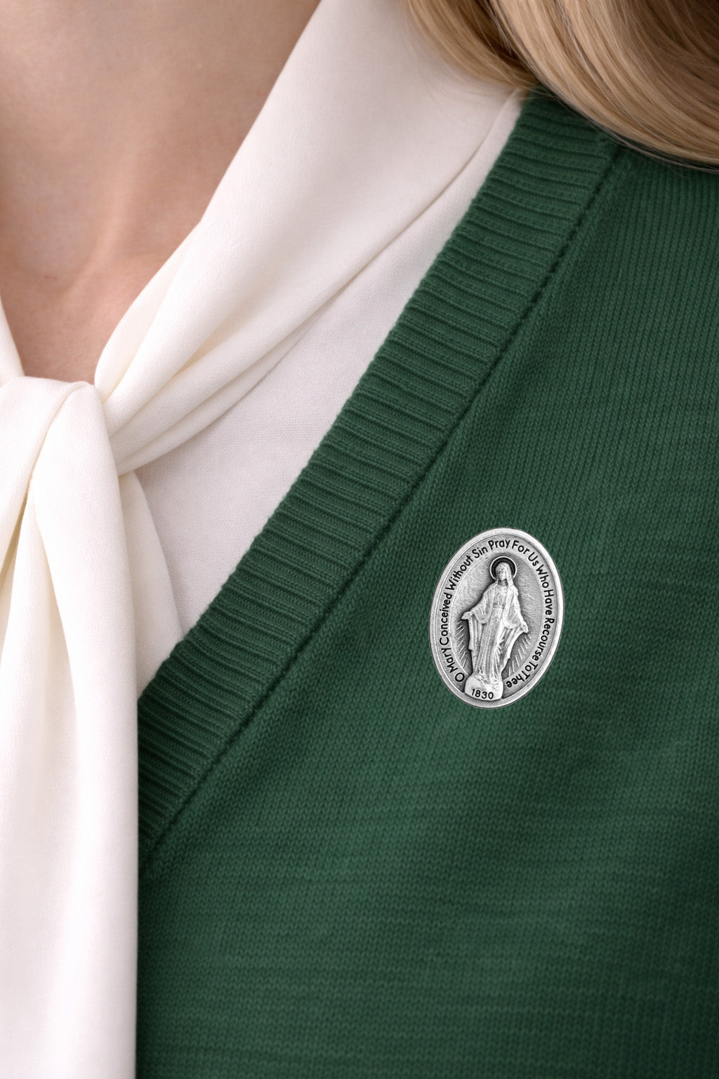 Miraculous Medal Mother Mary Lapel Pin green sweater