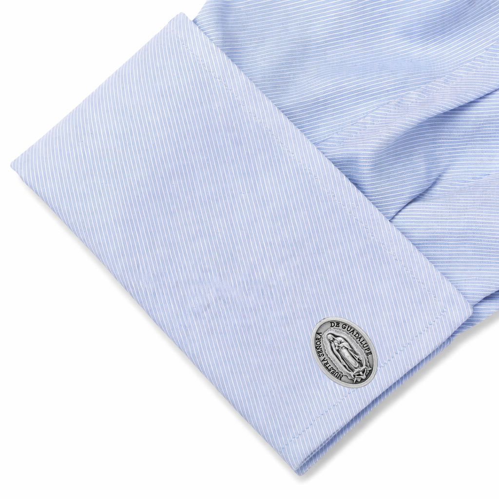 Close-up of a light blue dress shirt with a cufflink on a white background Italian made Our Lady of Guadalupe cufflinks silver-tone Catholic religious cuff links for men