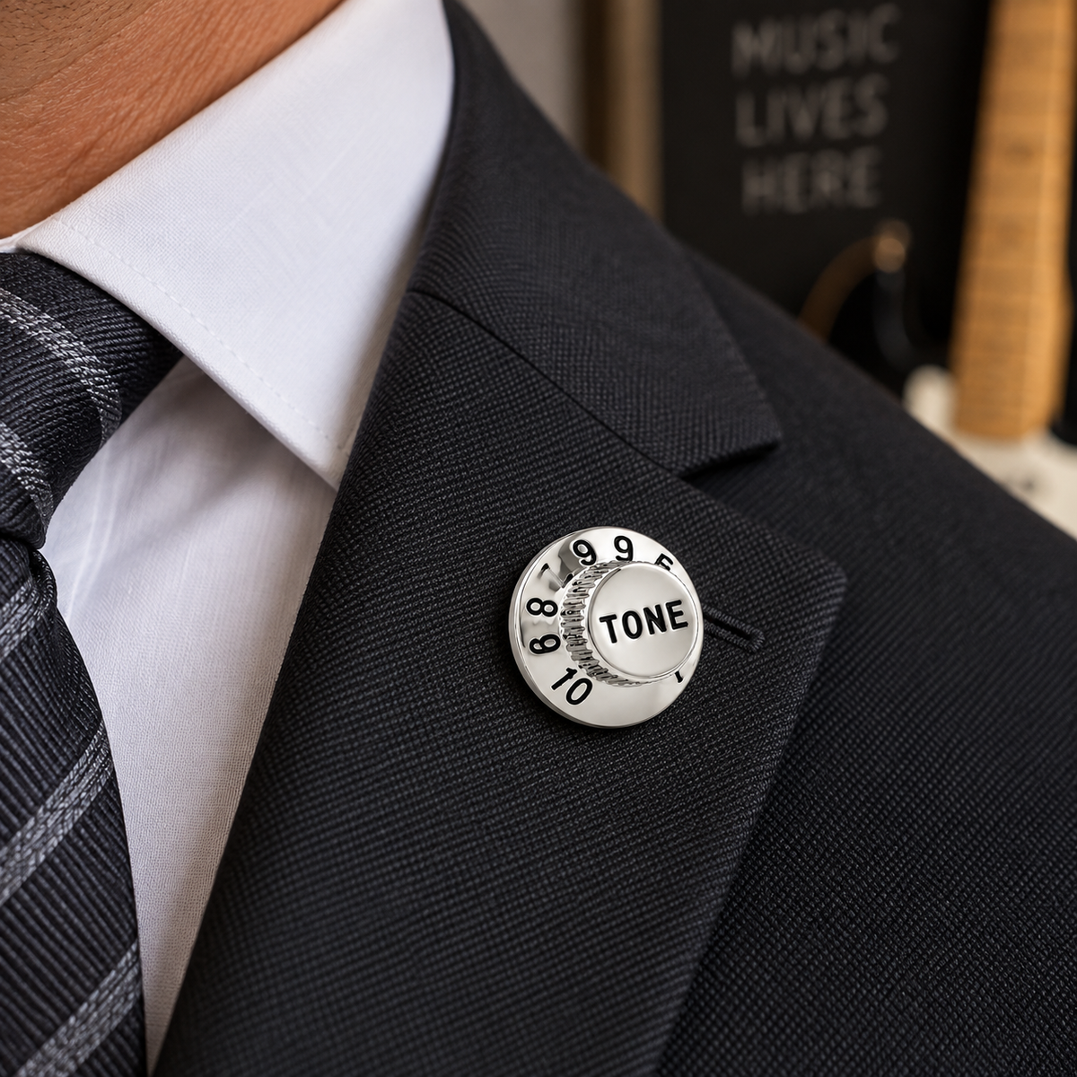 Guitar Tone Knob Lapel Pin on man's suit 