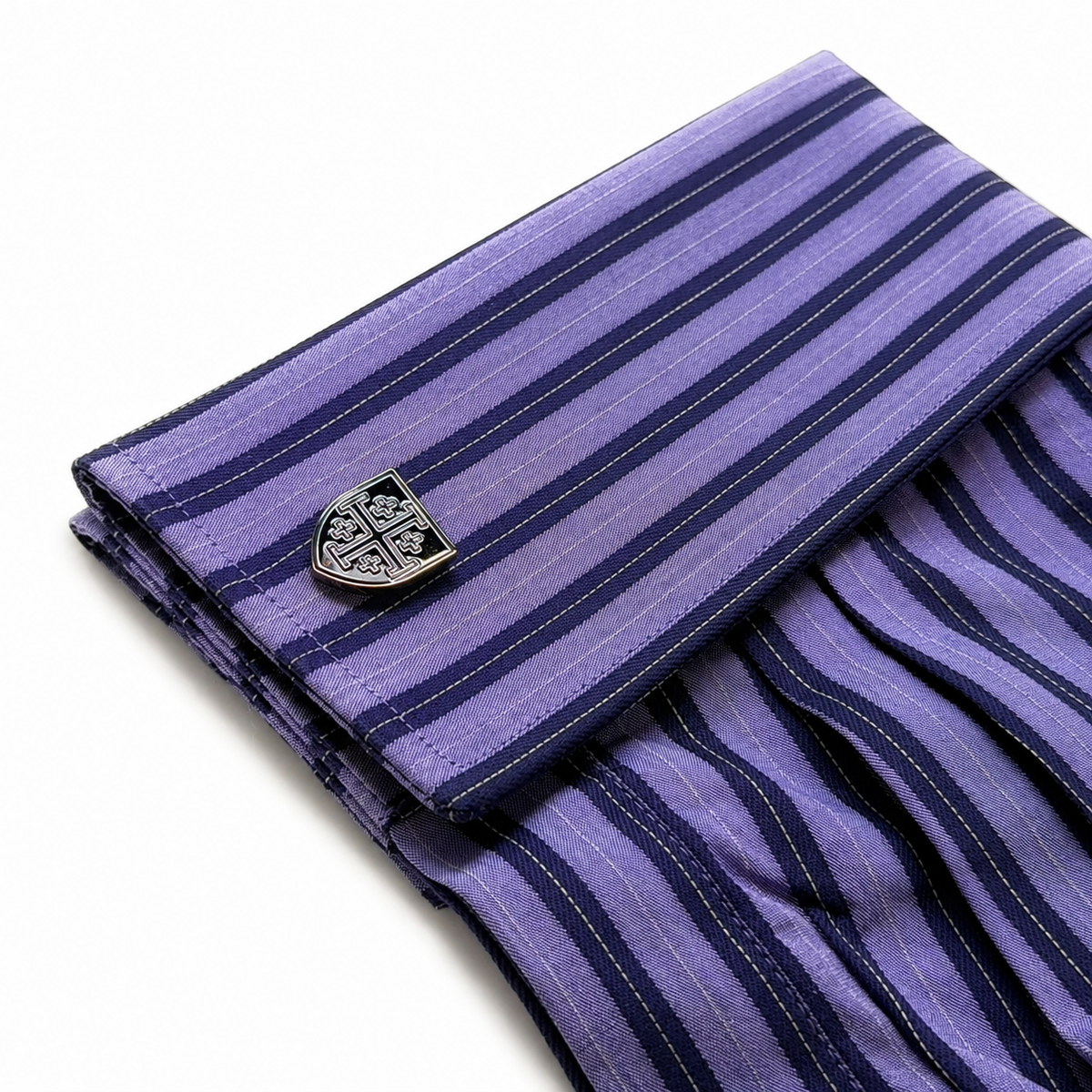 Jerusalem Cross shield cufflink on purple French cuff dress shirt