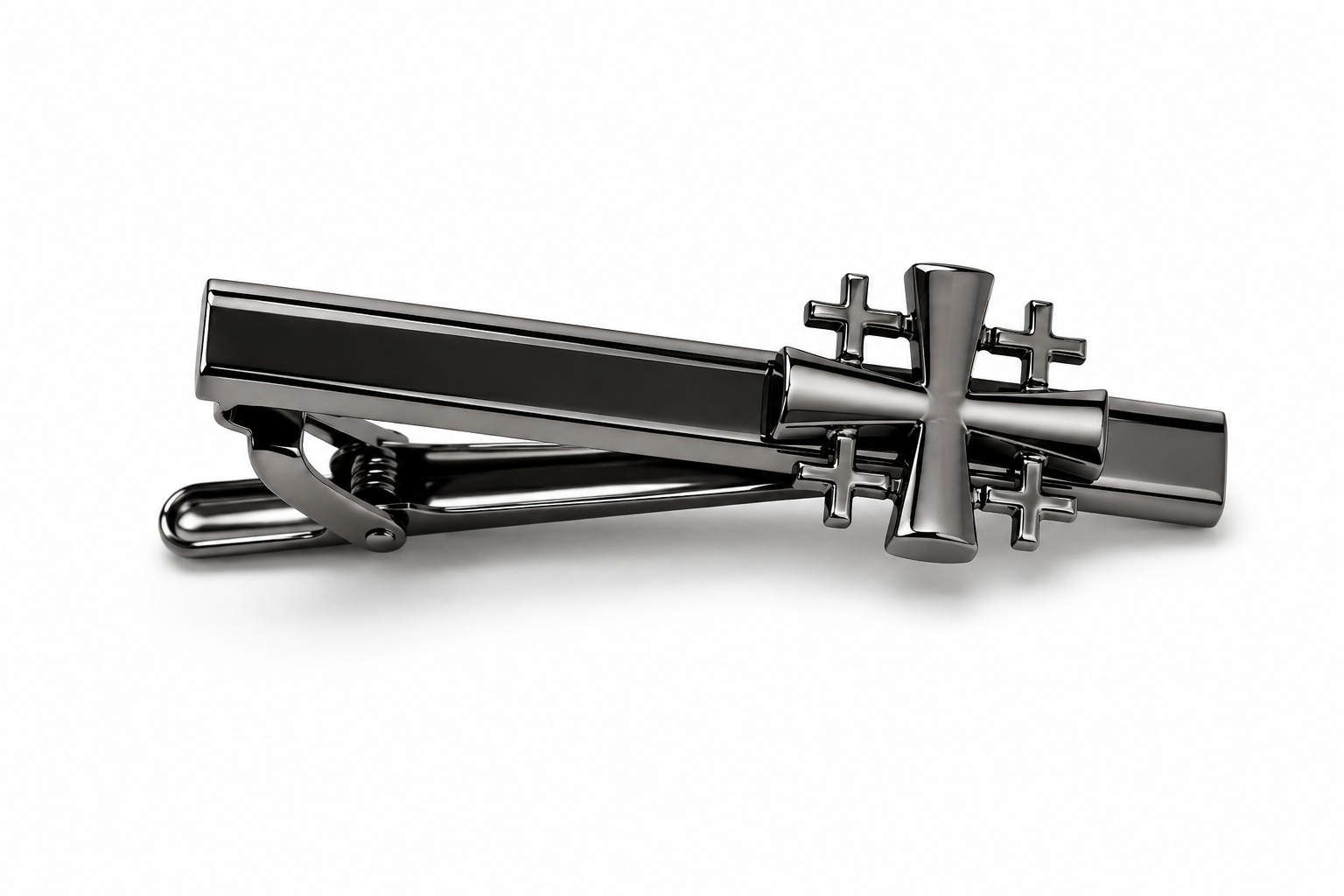 A dark gunmetal gray Gunmetal Jerusalem Cross Tie Clip featuring a polished cross design on the bar, set against a clean white background.