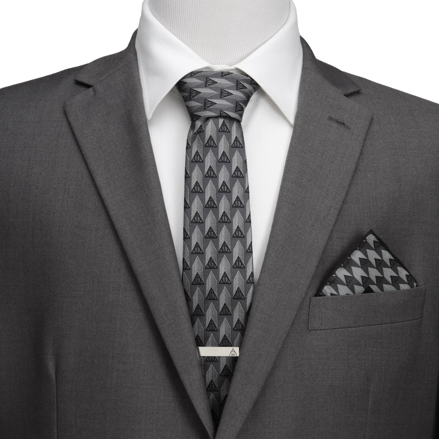 Gray suit with patterned tie and pocket square on a mannequin