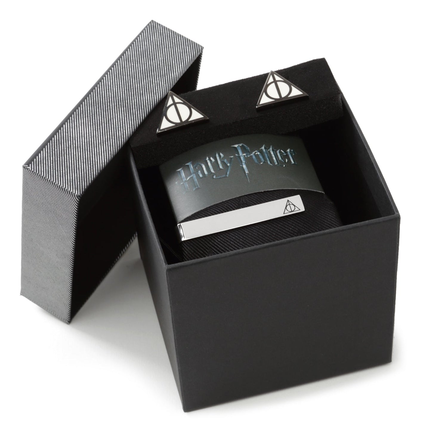Black Harry Potter-themed box with a card inside on a white background