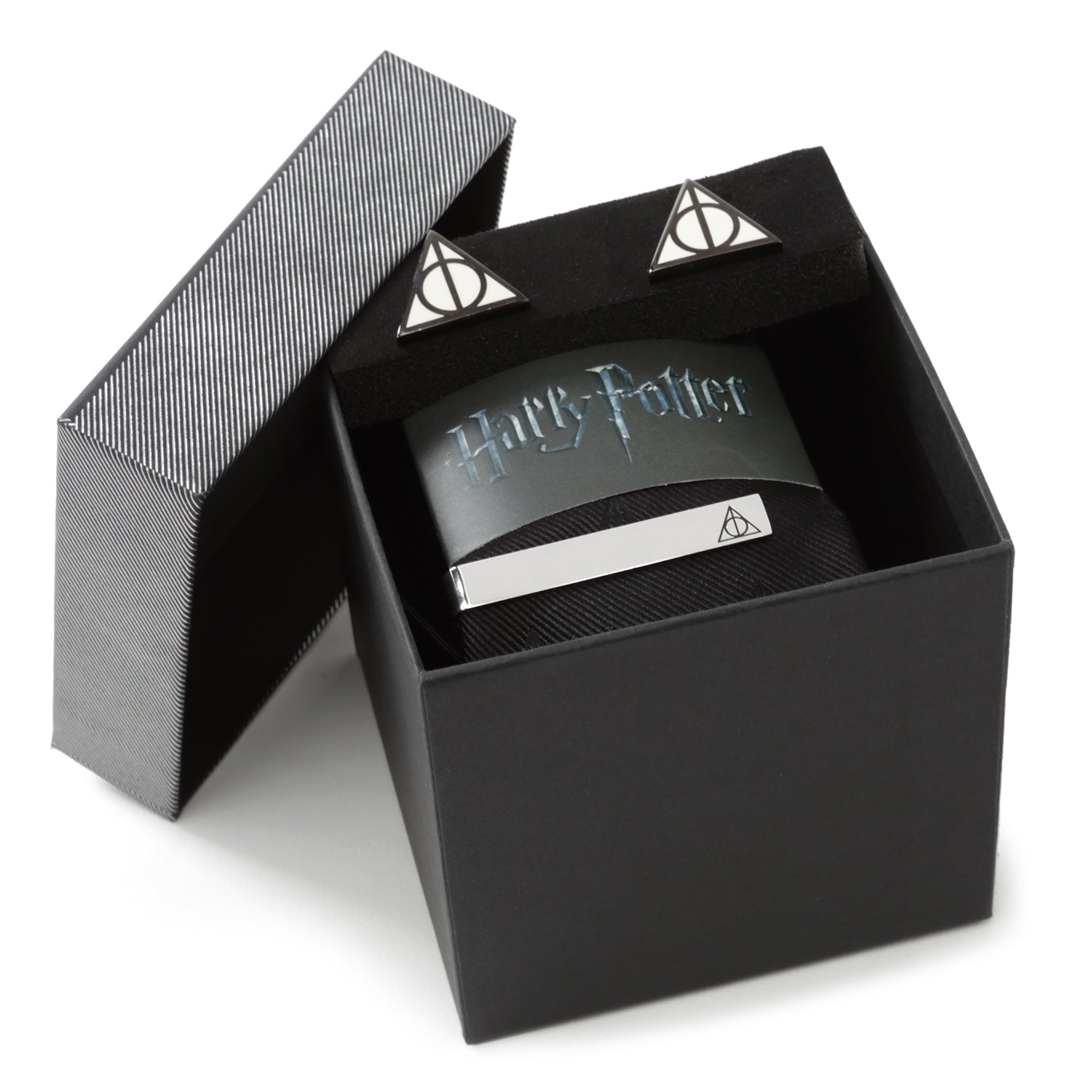 Black Harry Potter-themed box with a card inside on a white background
