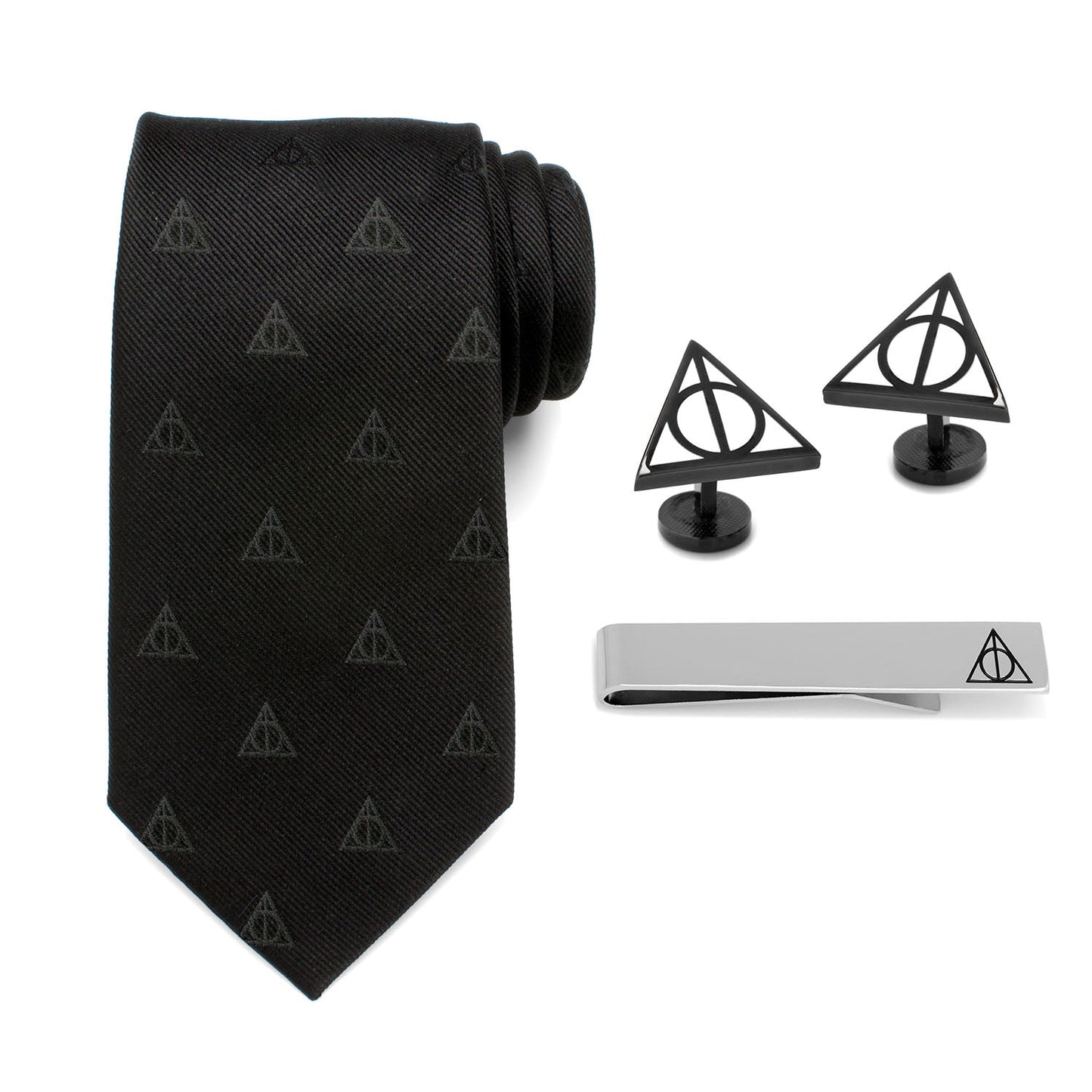 Black tie with Deathly Hallows pattern, two black cufflinks, and a silver tie clip on a white background