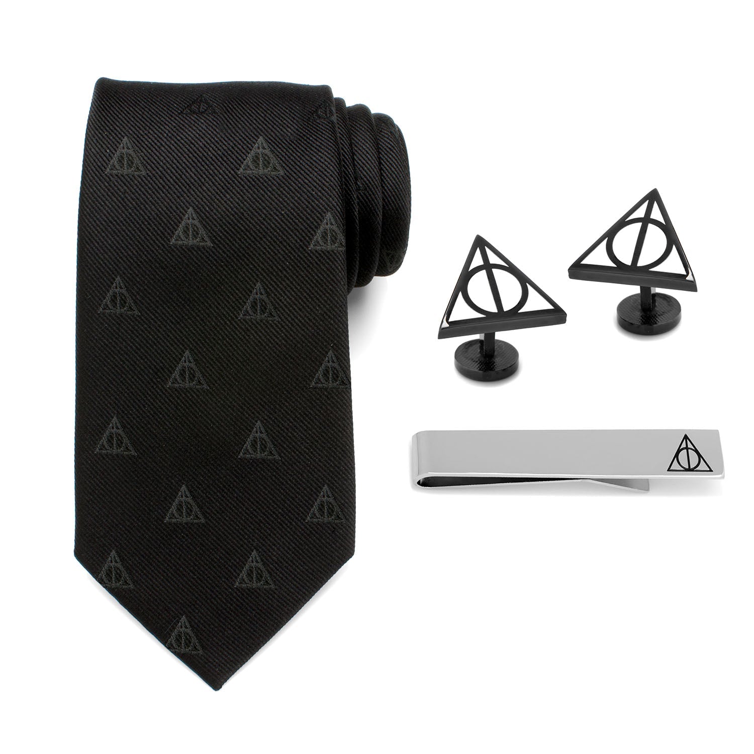 Black tie with Deathly Hallows pattern, two black cufflinks, and a silver tie clip on a white background