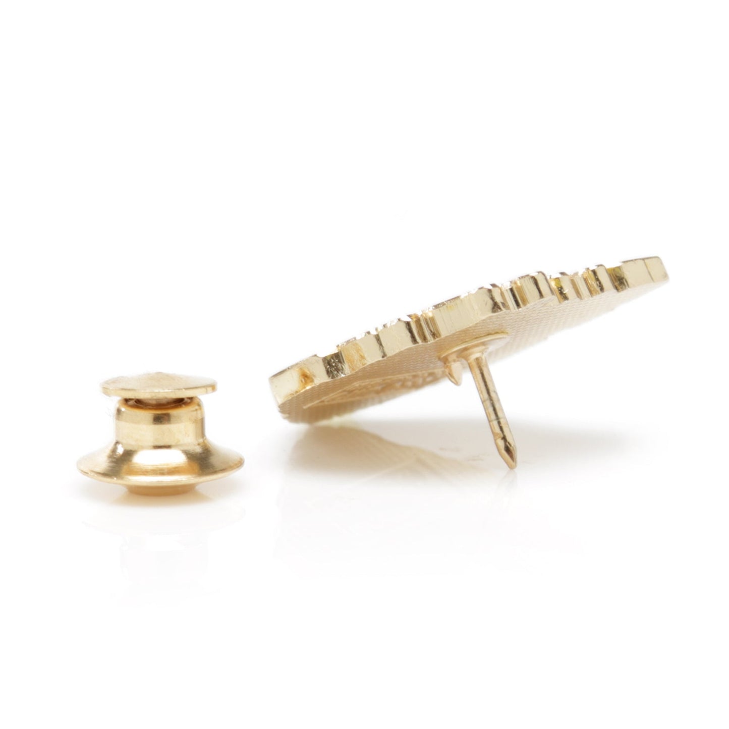 Gold earring on a white background