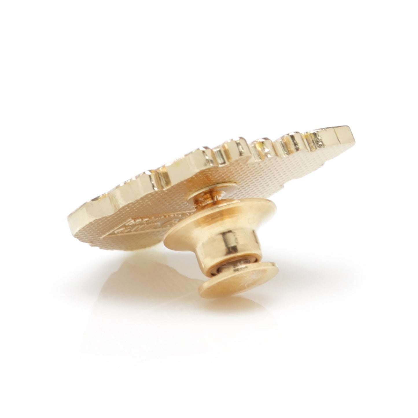 Gold decorative object on a white background