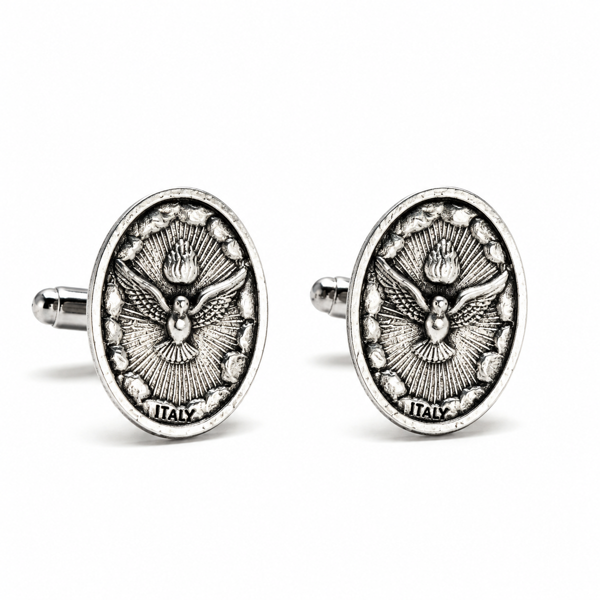 A pair of oval silver-toned cufflinks featuring an embossed dove motif with a flame and the word 'ITALY' at the bottom, shown on a clean white background.