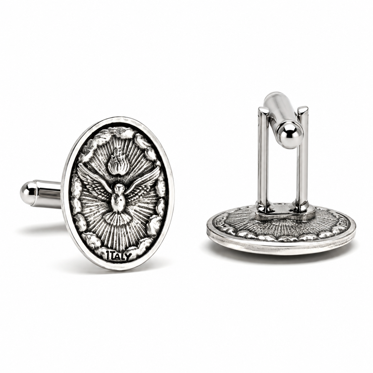 A pair of silver-toned oval cufflinks on a white background. One cufflink is shown from the front, featuring an embossed dove motif with the word 'ITALY' at the bottom.