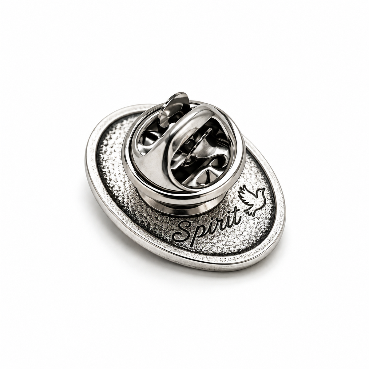 Silver-toned oval lapel pin back with a textured border, the word 'Spirit' in script, a dove outline, and a spring clasp mechanism on a white background.