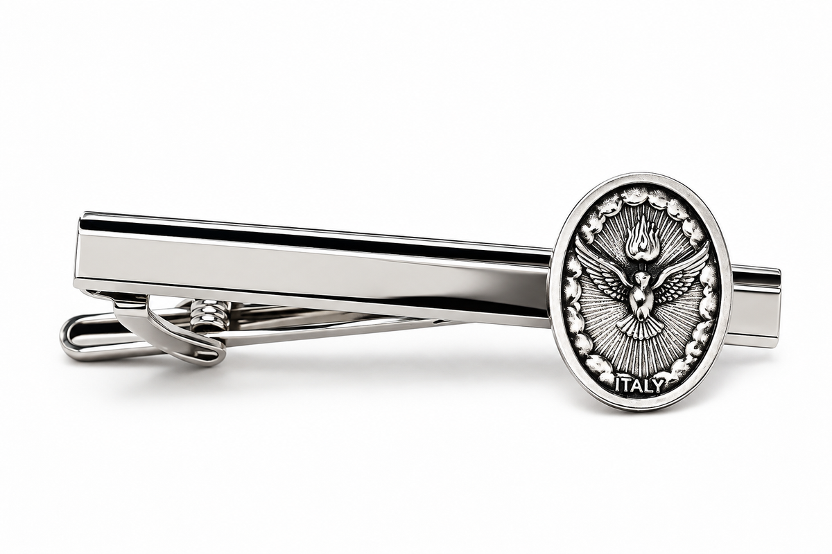 A silver-toned metal tie clip featuring a round medallion with an eagle emblem and the word 'ITALY' on a plain white background.