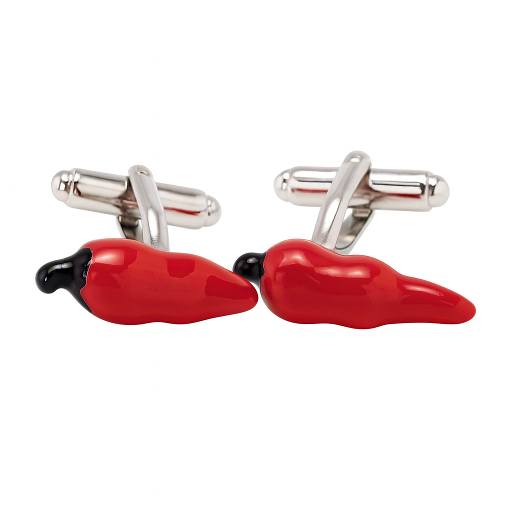 Red pepper-shaped cufflinks with silver prongs on a white background