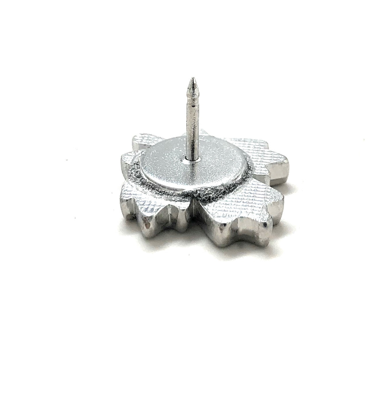 Red maple leaf lapel pin with silver outline and butterfly clasp displayed on white background