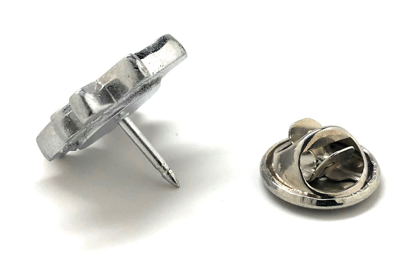 Red maple leaf lapel pin with silver outline and butterfly clasp displayed on white background