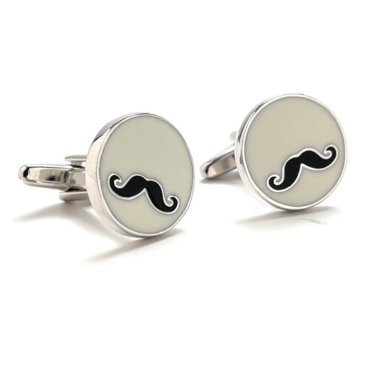 Cufflinks with mustache design on a white background