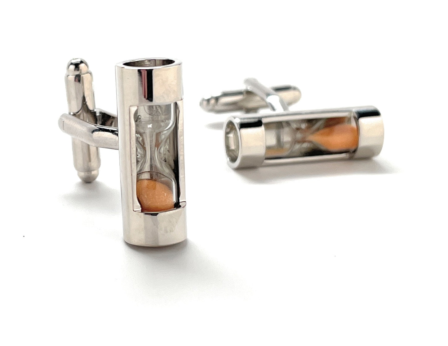 Silver hourglass cufflinks on a white background