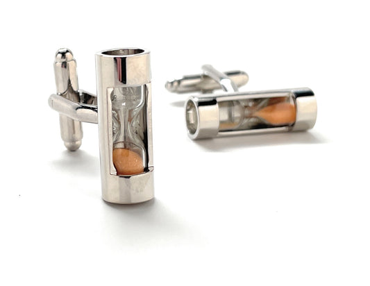 Silver hourglass cufflinks on a white background