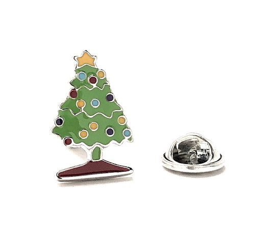 Colorful Christmas tree pin with a star on top against a white background
