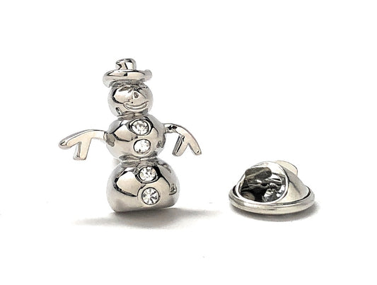Silver snowman-shaped lapel pin on a white background