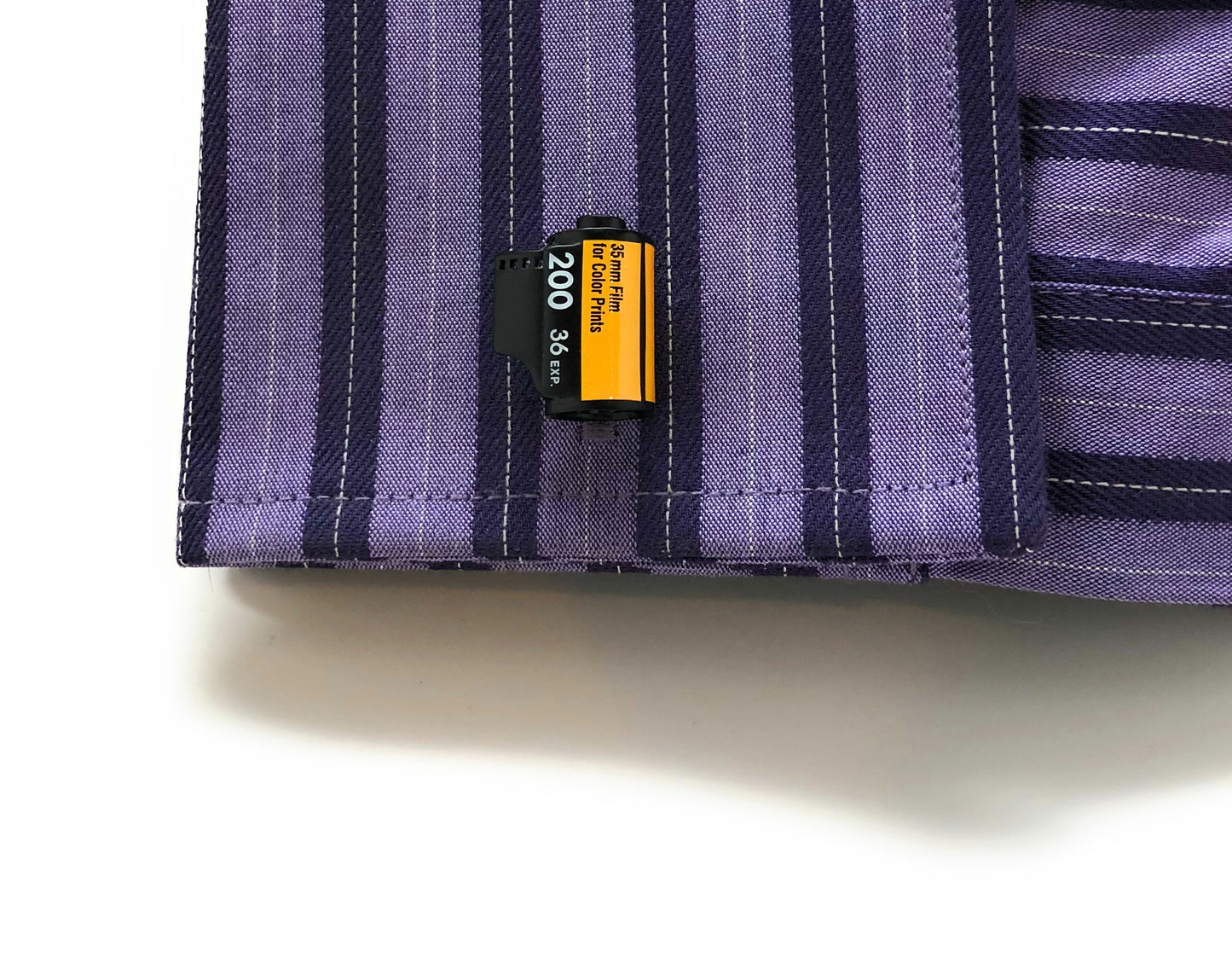 35mm film roll cufflinks in black and yellow with 200 ISO design – photographer gift idea purple shirt
