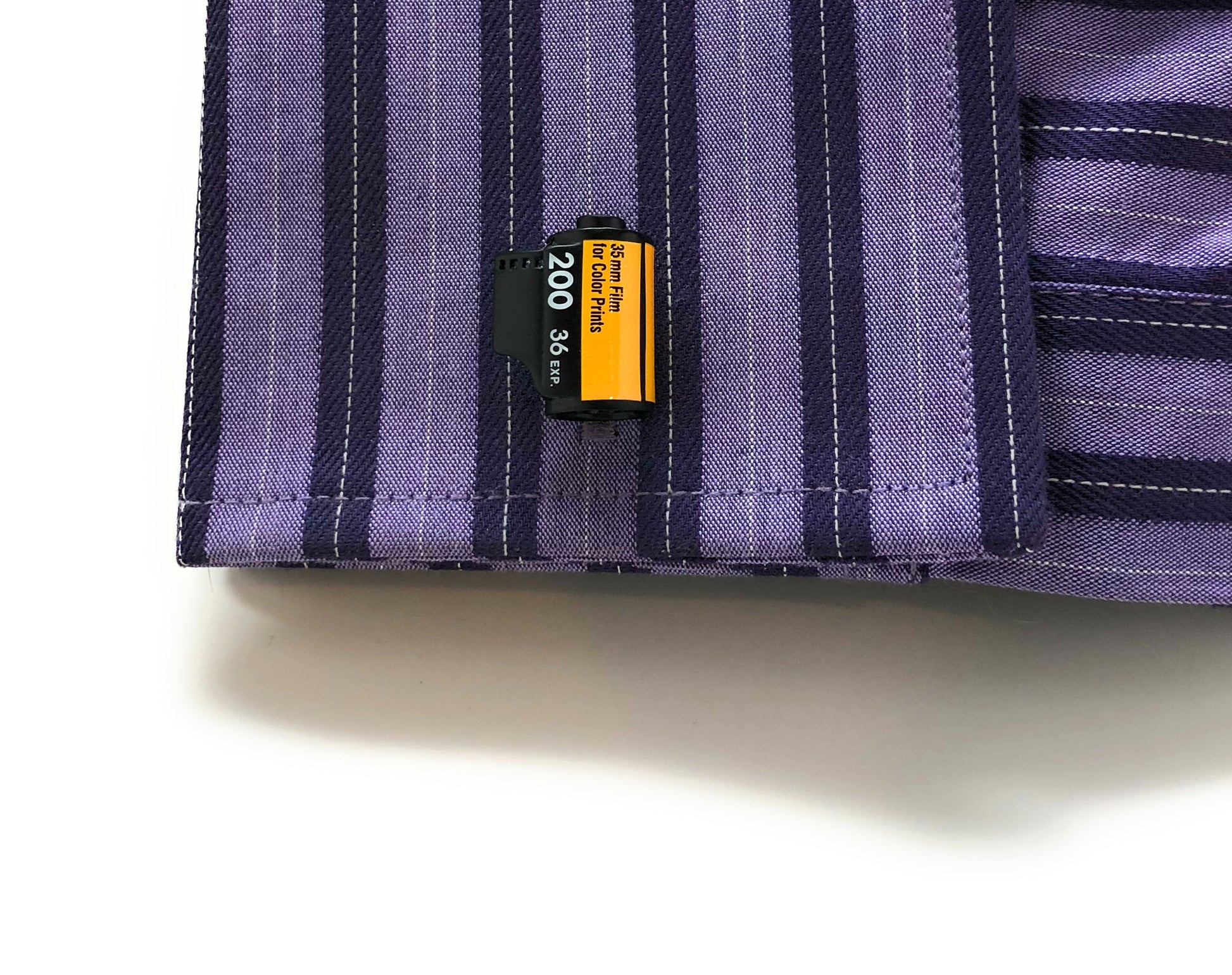 35mm film roll cufflinks in black and yellow with 200 ISO design – photographer gift idea purple shirt