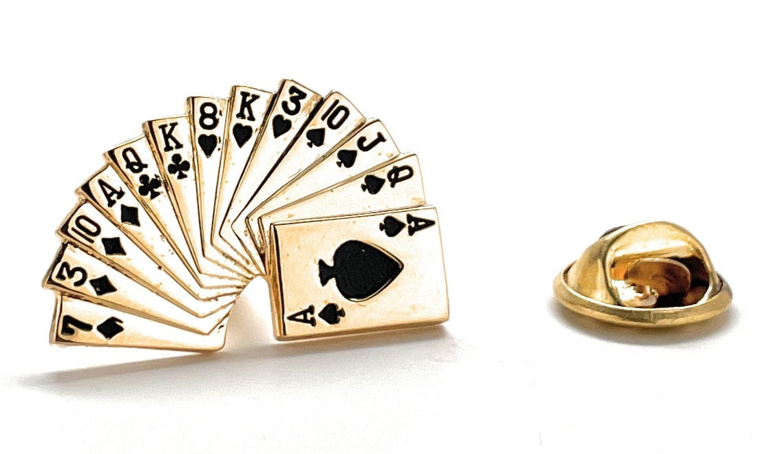 Gold playing card fan-shaped lapel pin on a white background