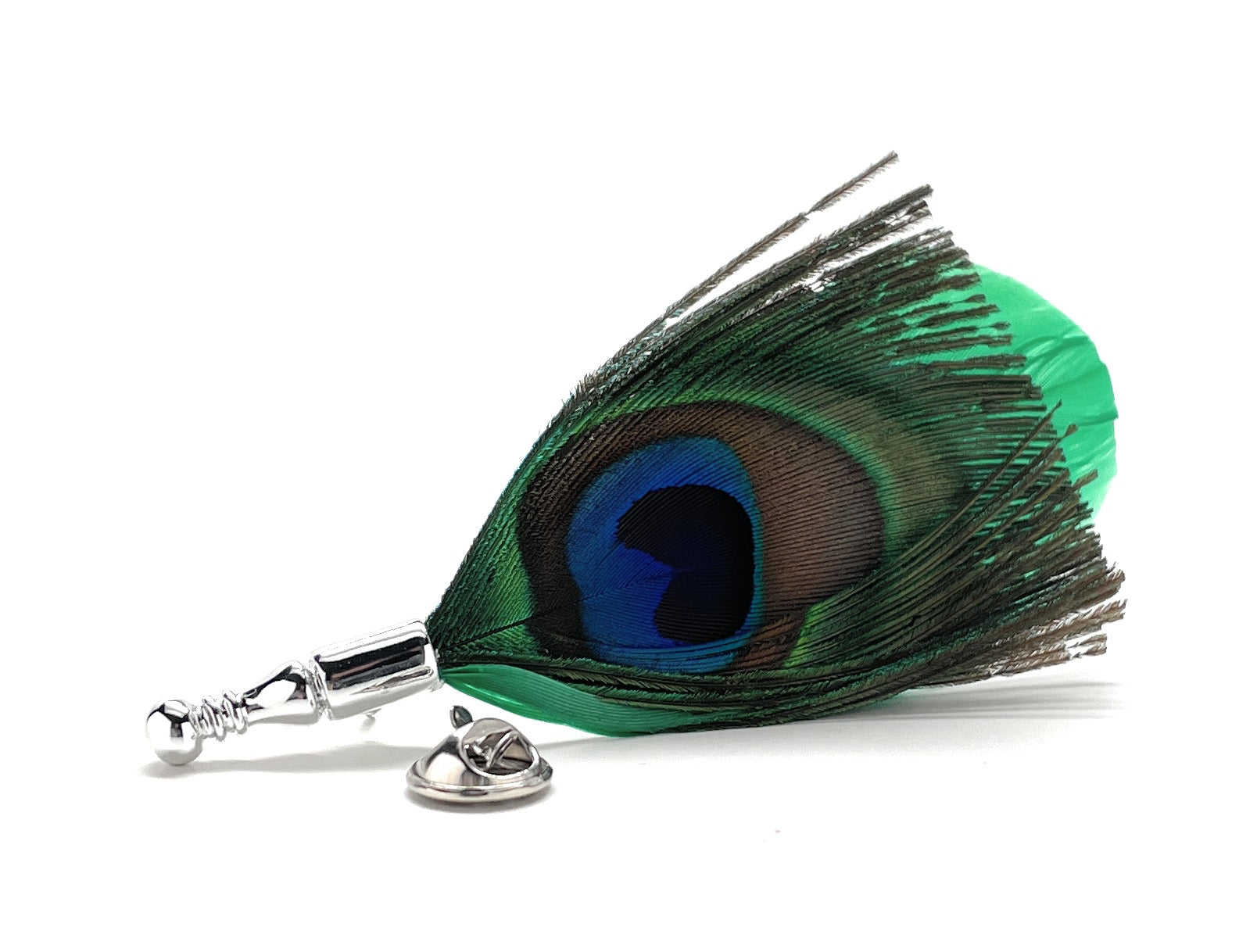 Green peacock feather lapel pin with silver pin backing and vibrant blue and green eye pattern.