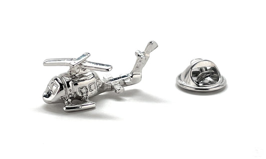 Silver helicopter cufflinks on a white background