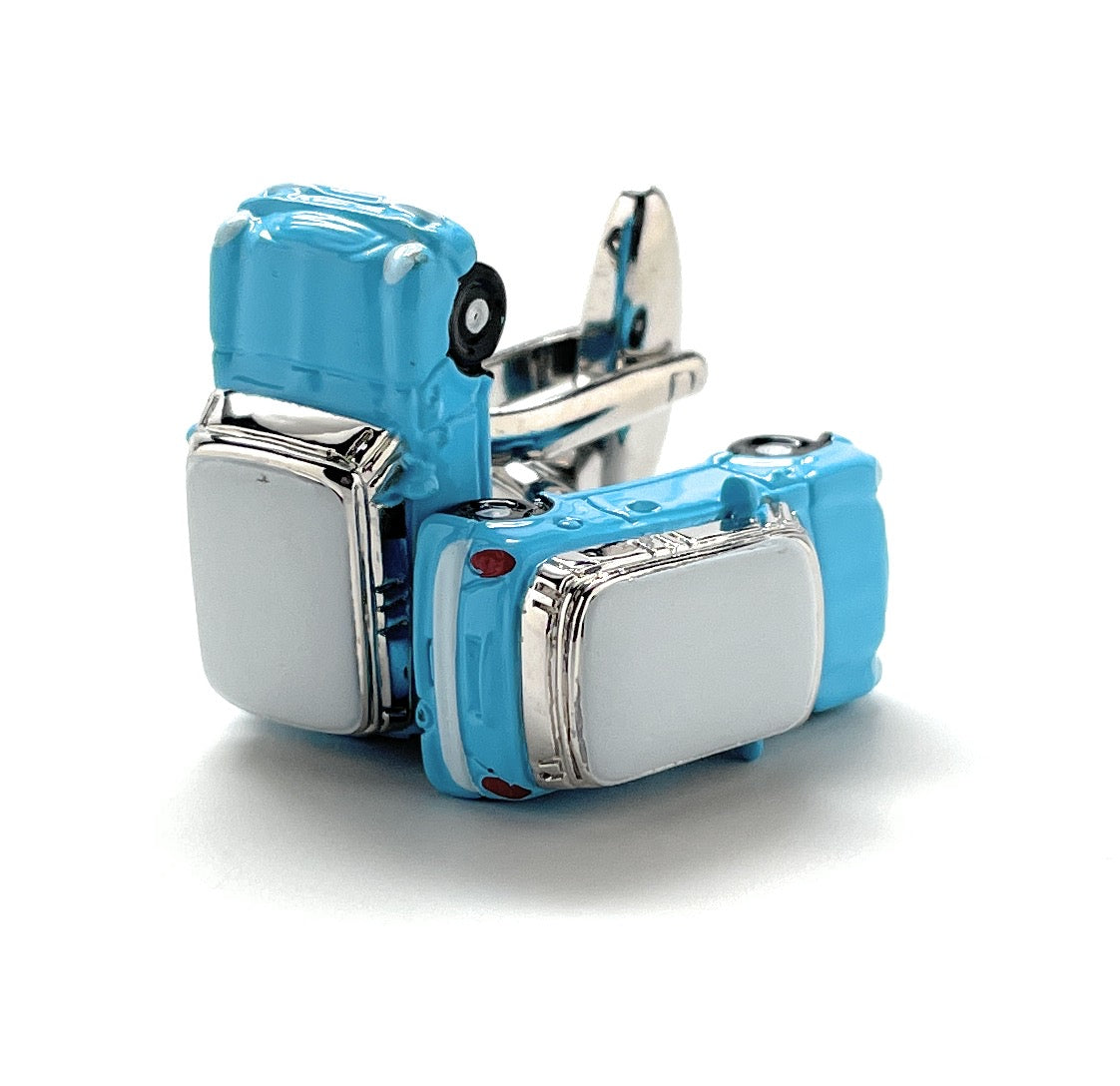Blue and silver cufflinks on a white background