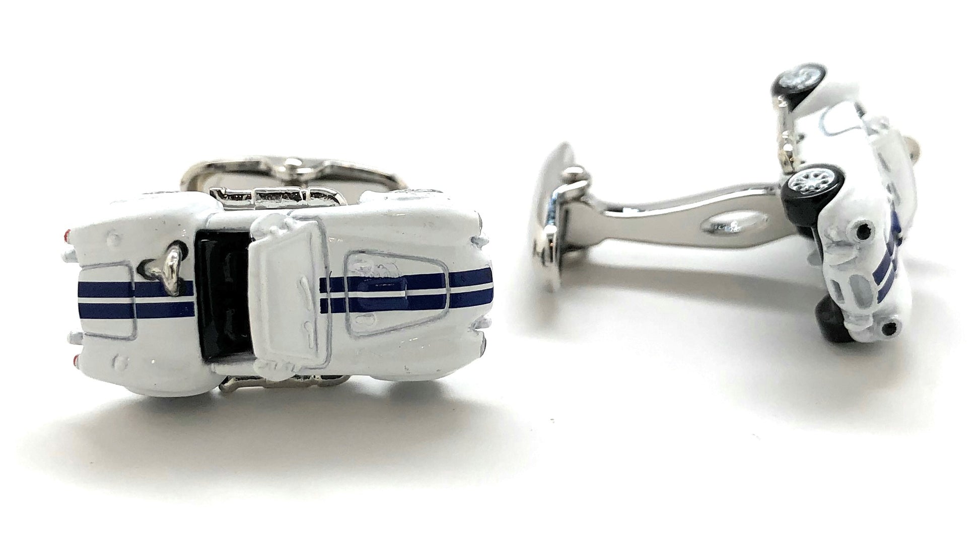 Cufflinks designed like a car on a white background