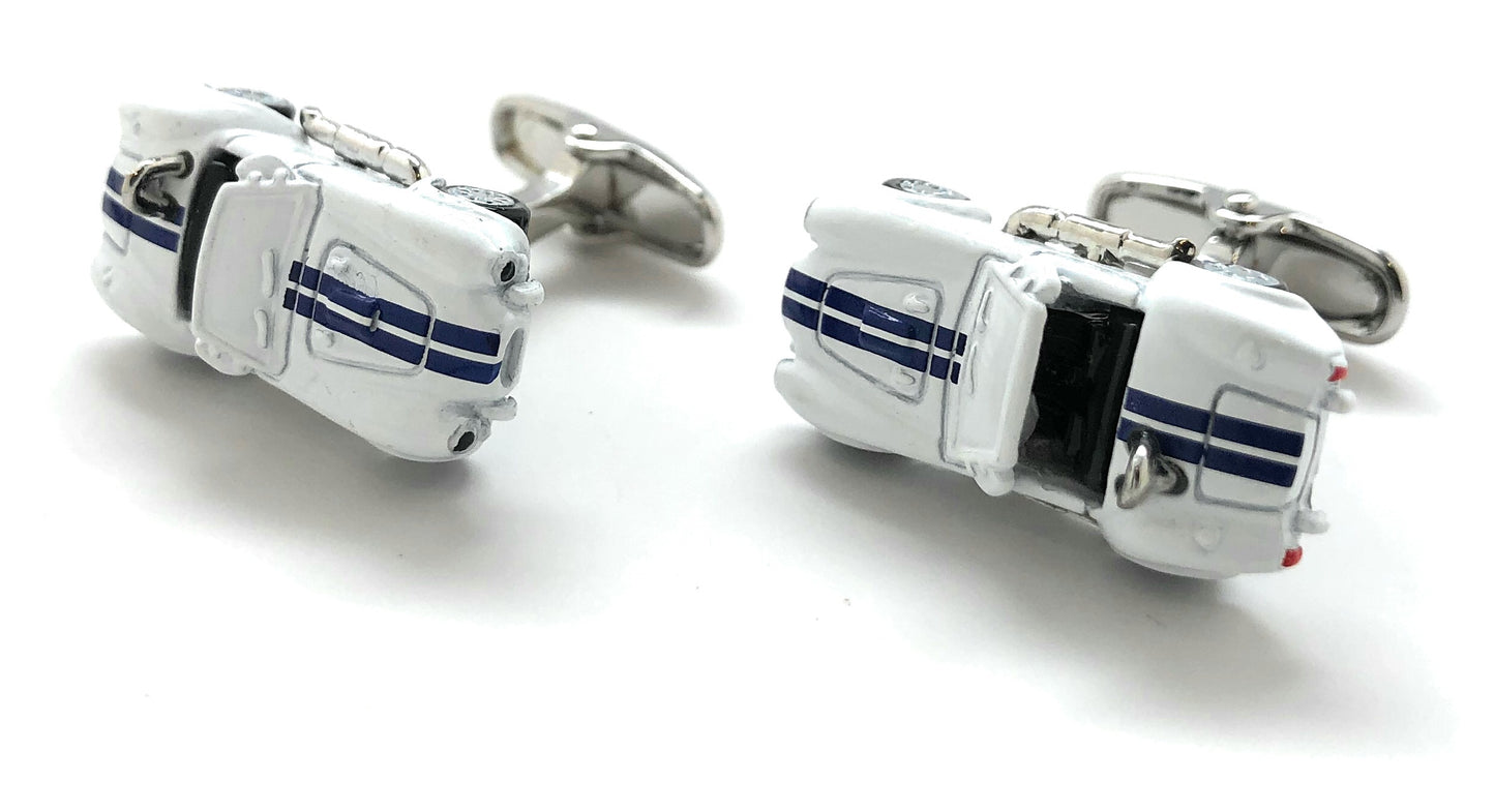 Cufflinks designed like R2-D2 from Star Wars on a white background