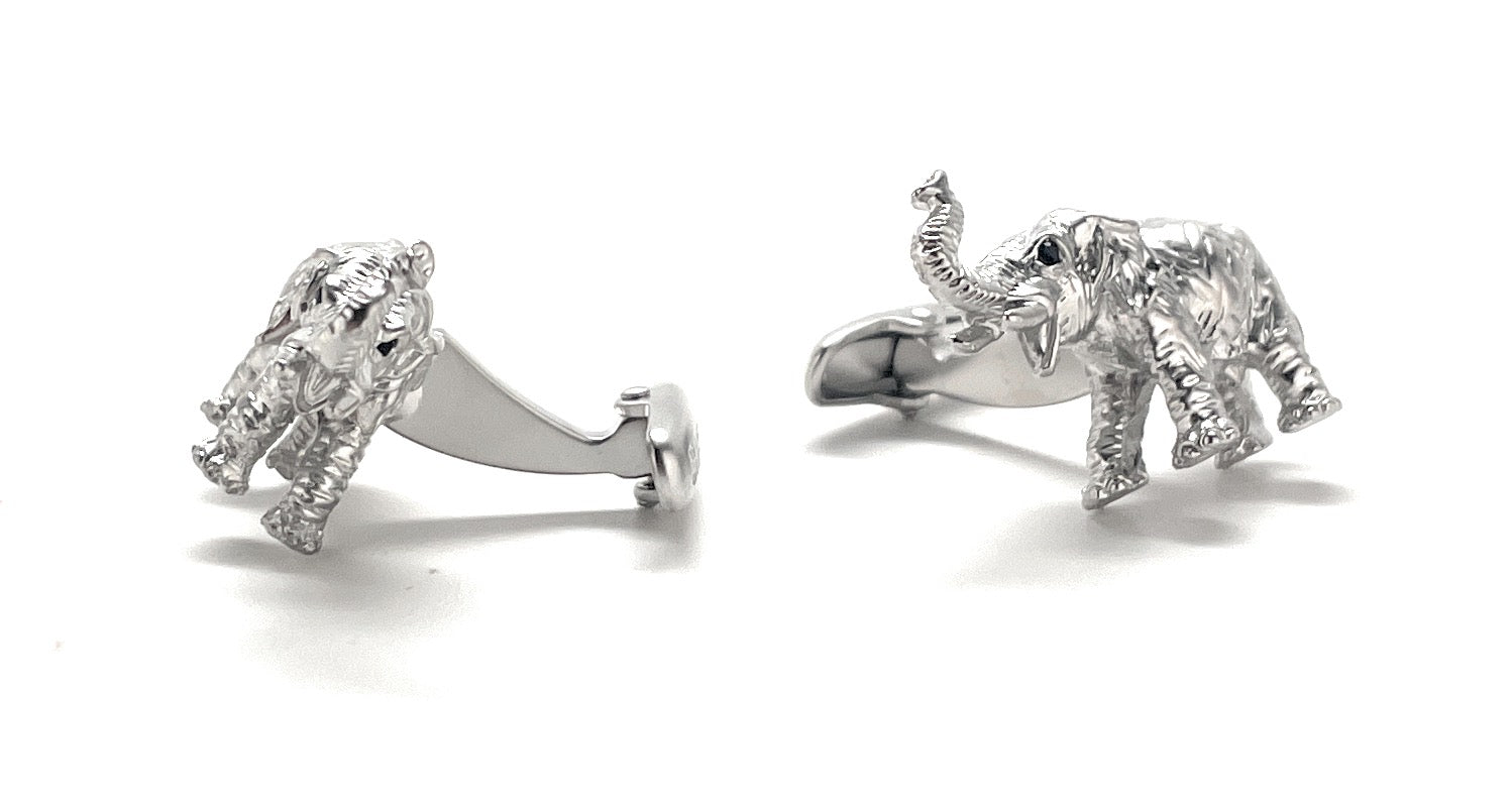 Silver elephant earrings on a white background