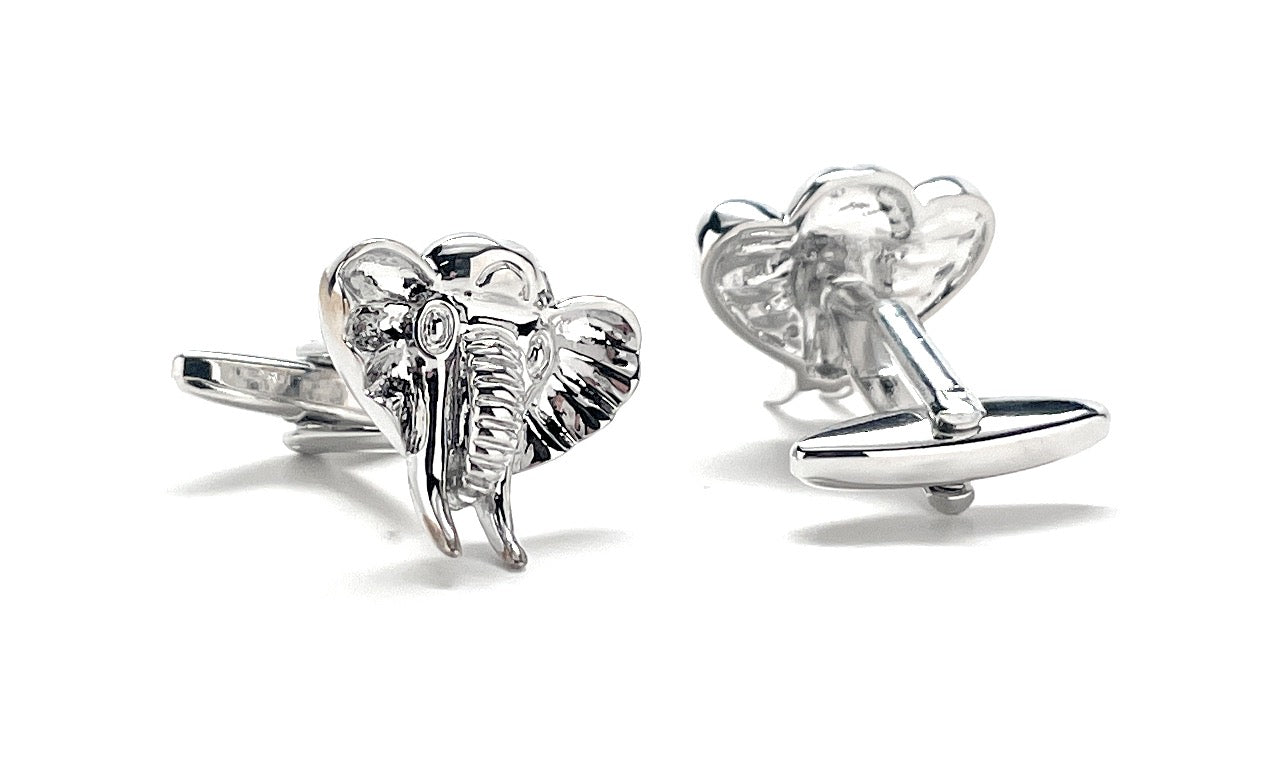 Silver elephant cufflinks on a white background