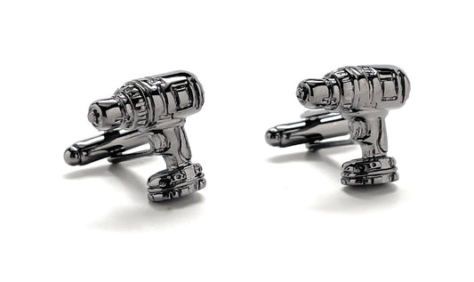 Cufflinks designed like a robot on a white background