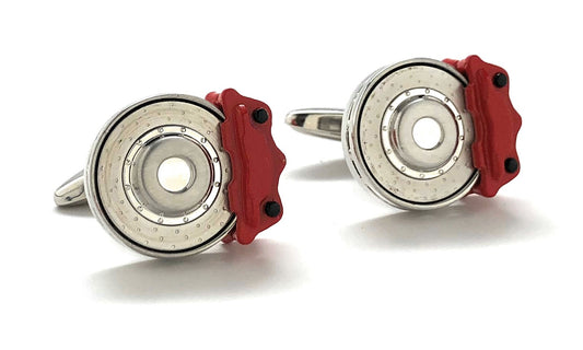 Cufflinks resembling brake calipers with red and silver design on a white background