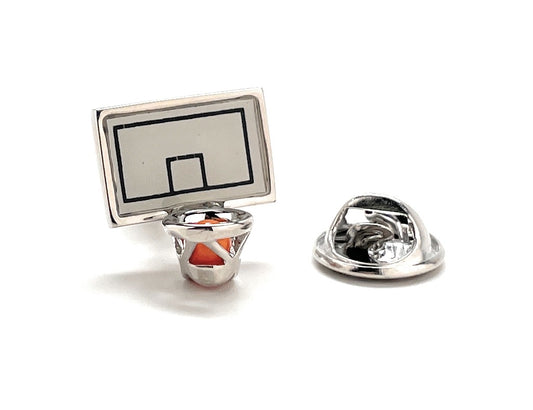 Metallic basketball hoop and ball lapel pin on a white background