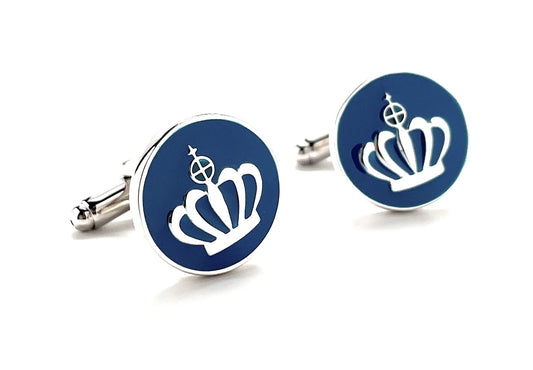 Cufflinks with a crown design on a white background
