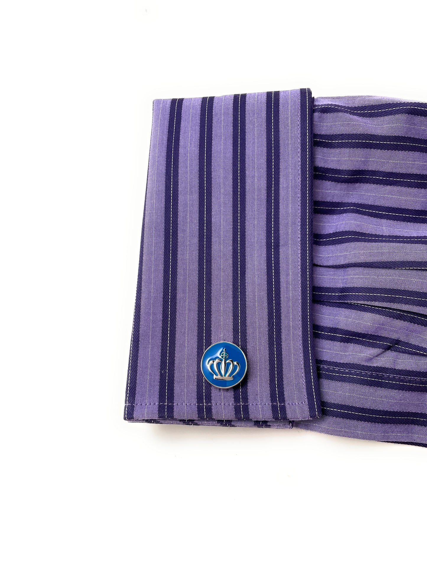 Purple striped fabric with a blue emblem on a white background