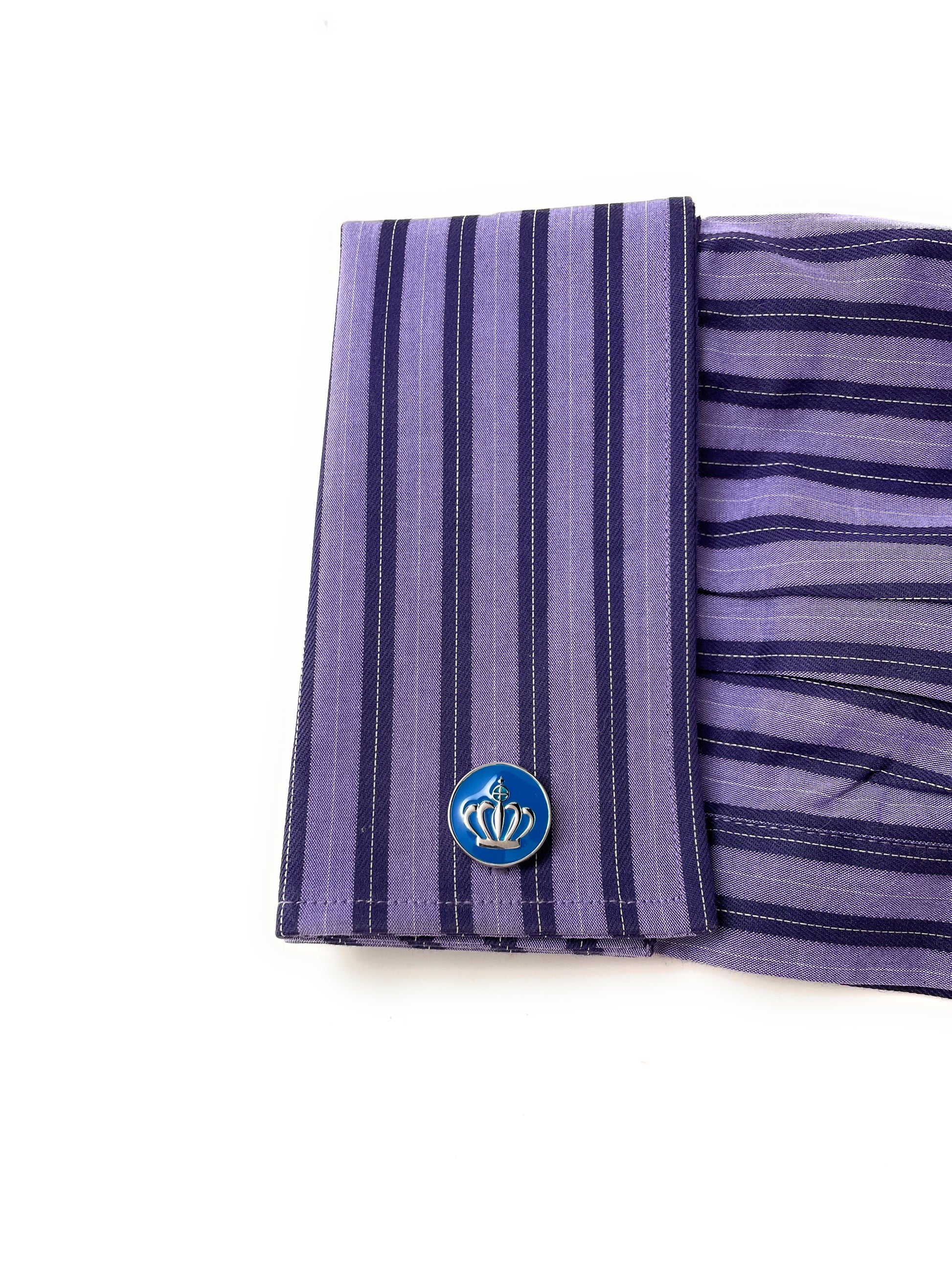 Purple striped fabric with a blue emblem on a white background